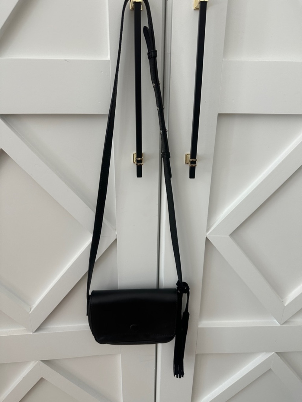 Coach and Four Black Leather Crossbody with Tassel